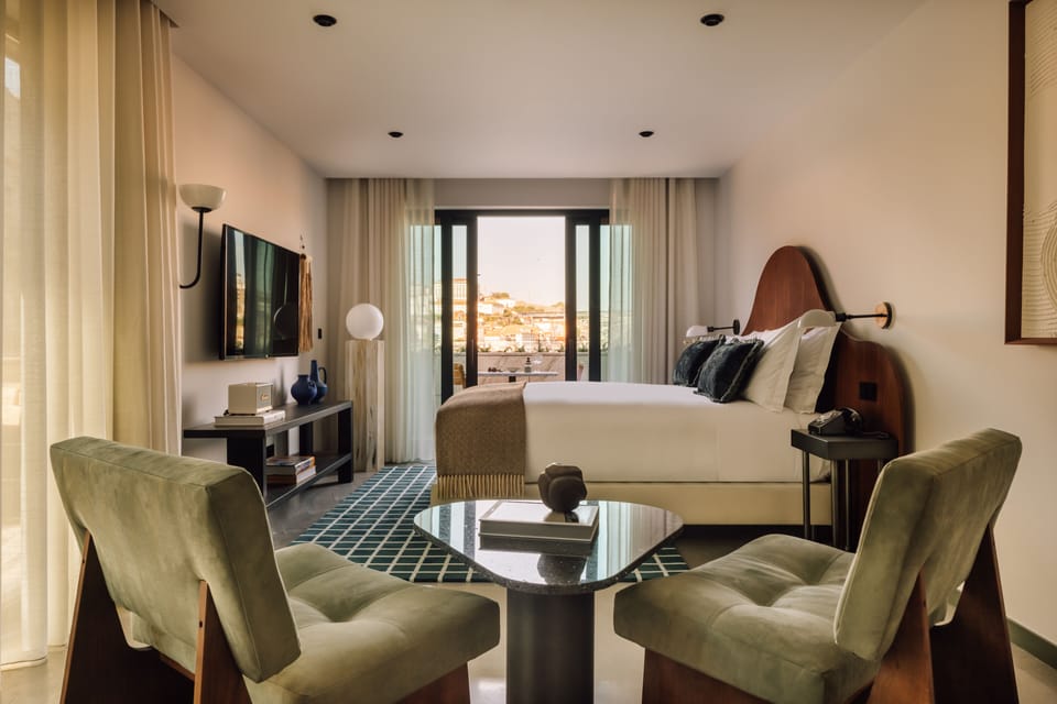 Studio, River View | Living area | 50-inch flat-screen TV with cable channels