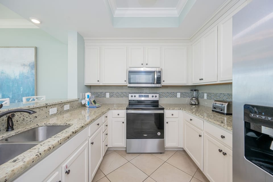 Condo, 2 Bedrooms | Private kitchen | Coffee/tea maker, fridge, oven