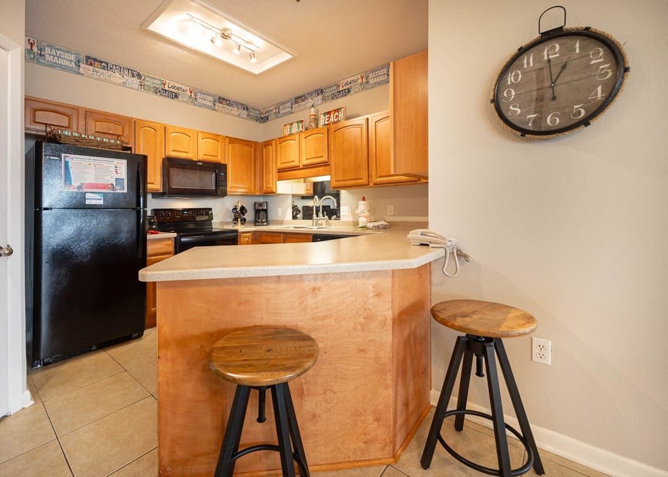 Condo, 2 Bedrooms | Private kitchen | Coffee/tea maker, fridge, oven
