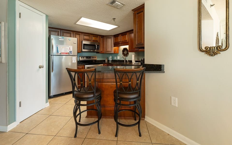 Condo, 2 Bedrooms | Private kitchen | Fridge, oven, coffee/tea maker