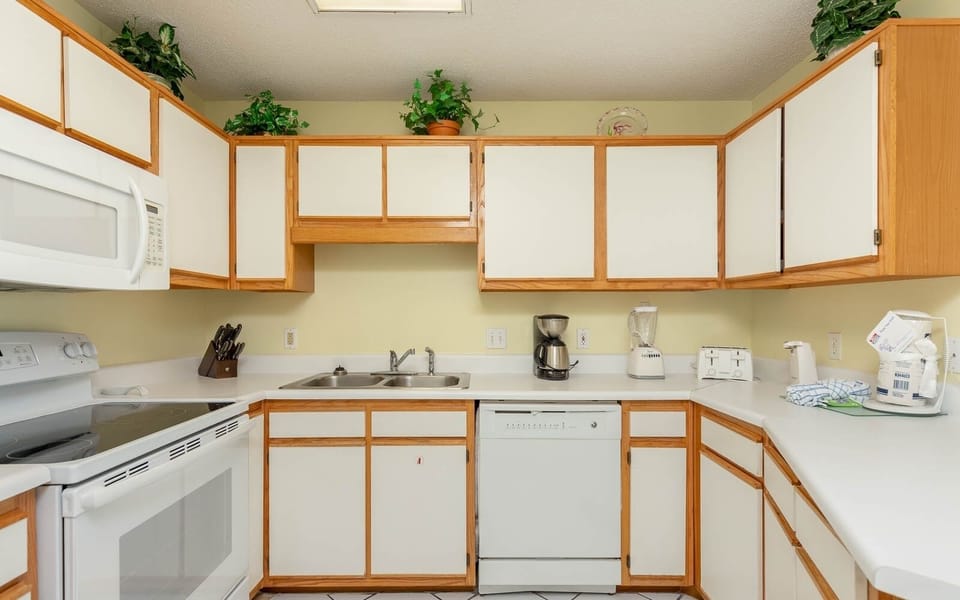 Condo, 2 Bedrooms | Private kitchen | Coffee/tea maker, fridge, oven