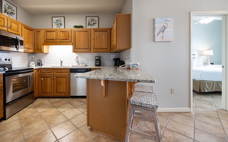 Condo, 2 Bedrooms | Private kitchen | Coffee/tea maker, fridge, oven