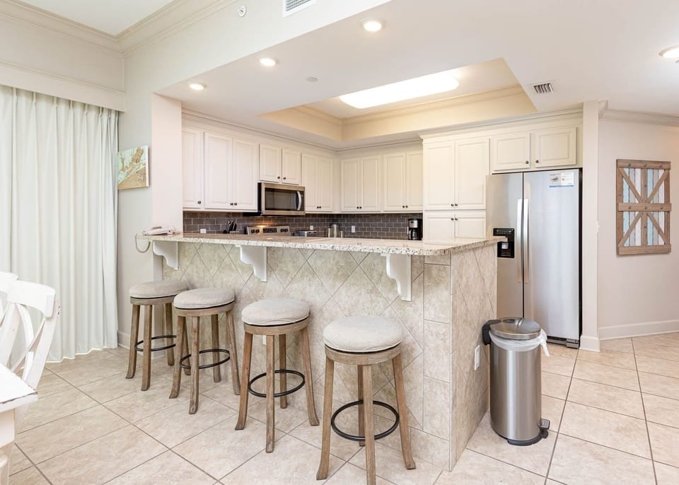 Condo, 4 Bedrooms | Private kitchen | Coffee/tea maker, fridge, oven