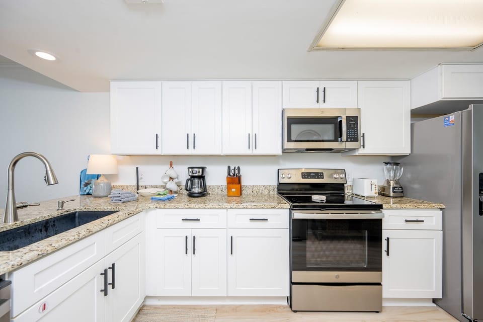Condo, 2 Bedrooms | Private kitchen | Coffee/tea maker, fridge, oven
