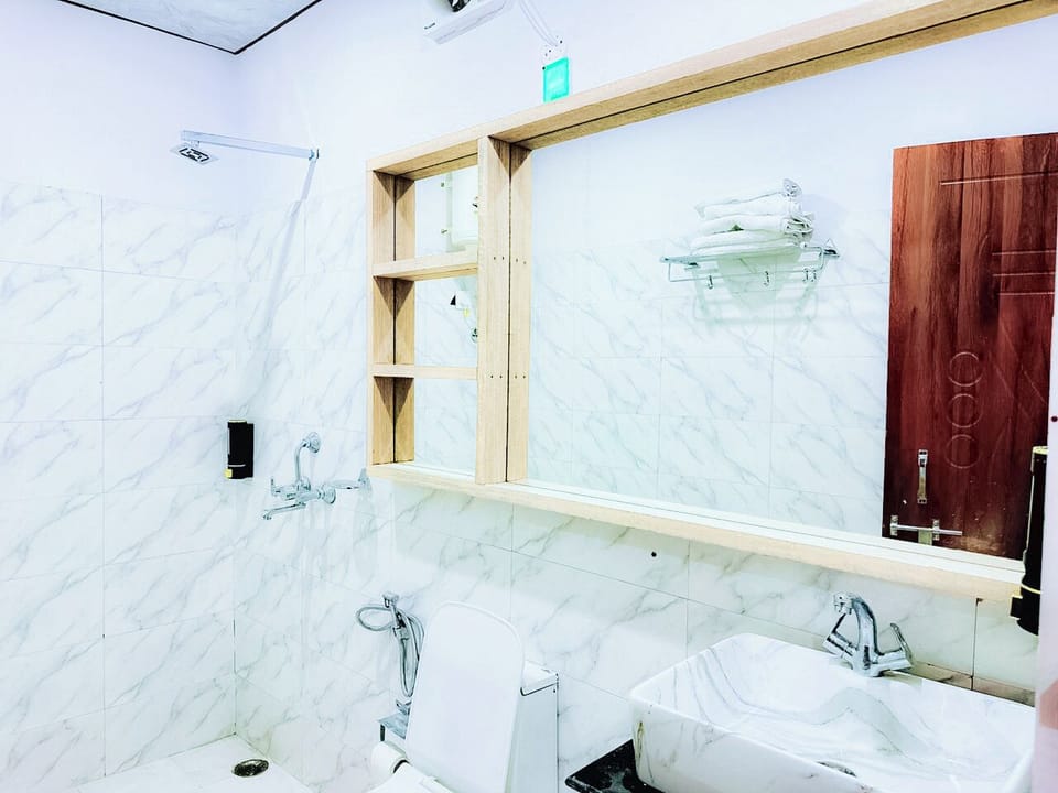 Hair dryer, slippers, towels, soap