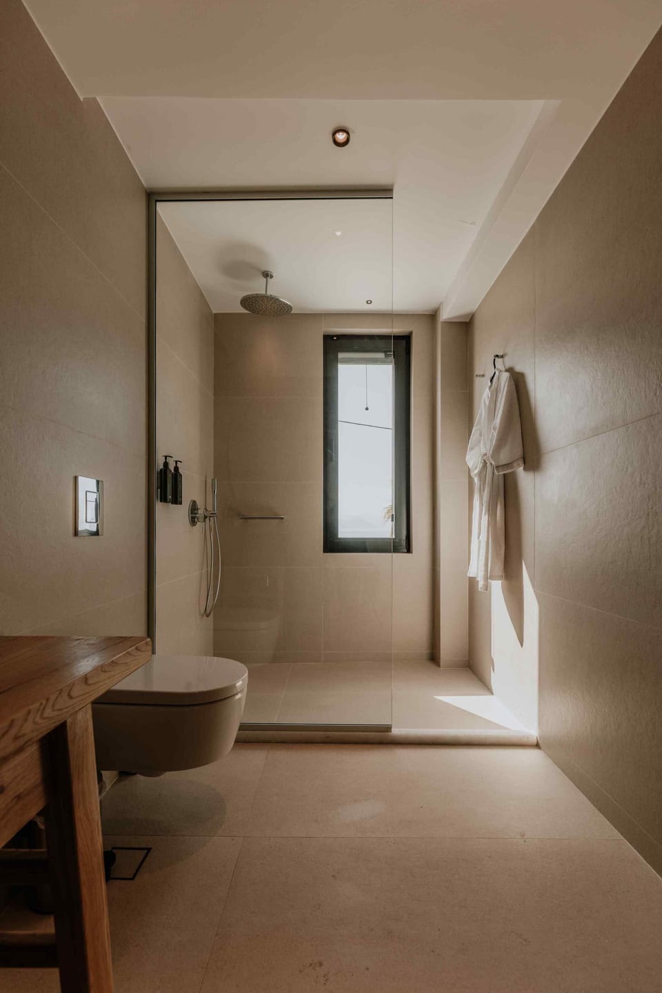 Shower, designer toiletries, hair dryer, bathrobes