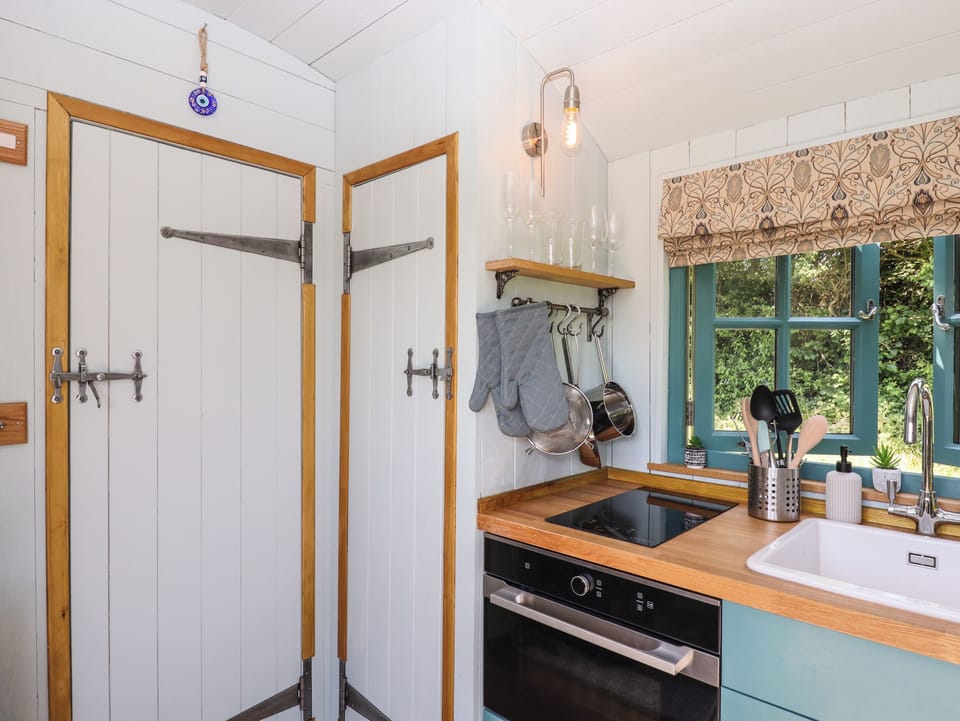 Fridge, electric kettle, toaster, cookware/dishes/utensils