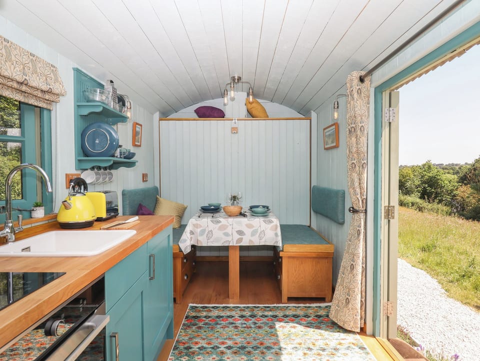 Fridge, electric kettle, toaster, cookware/dishes/utensils
