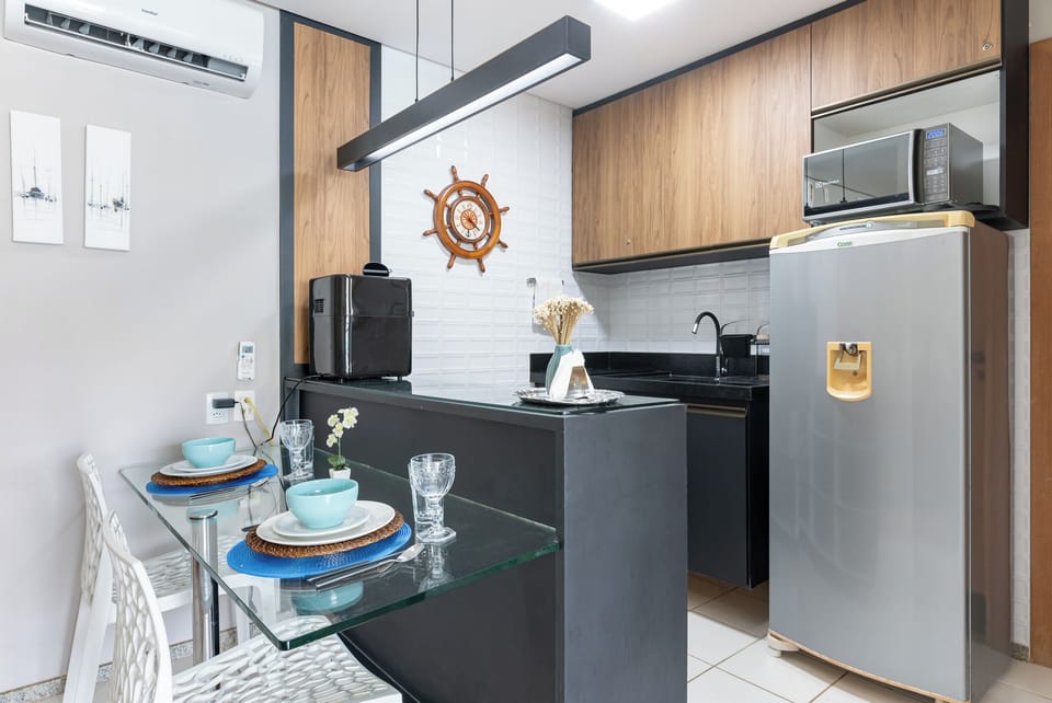 Basic Apartment | Private kitchen | Fridge, cookware/dishes/utensils, paper towels