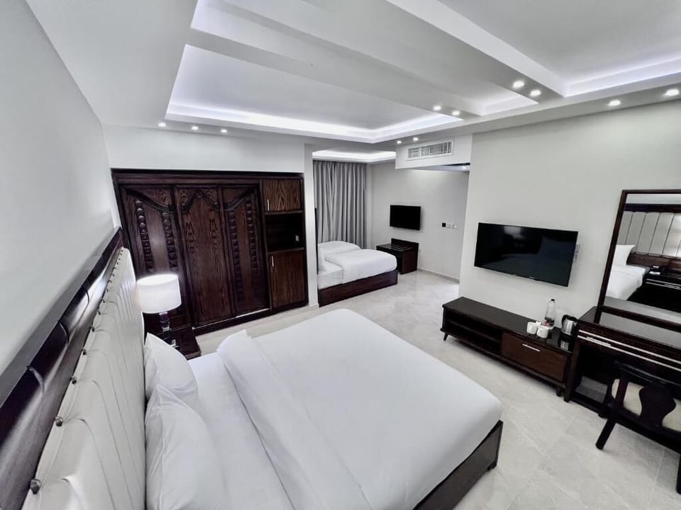 Family Room | Iron/ironing board (on request), WiFi (free)