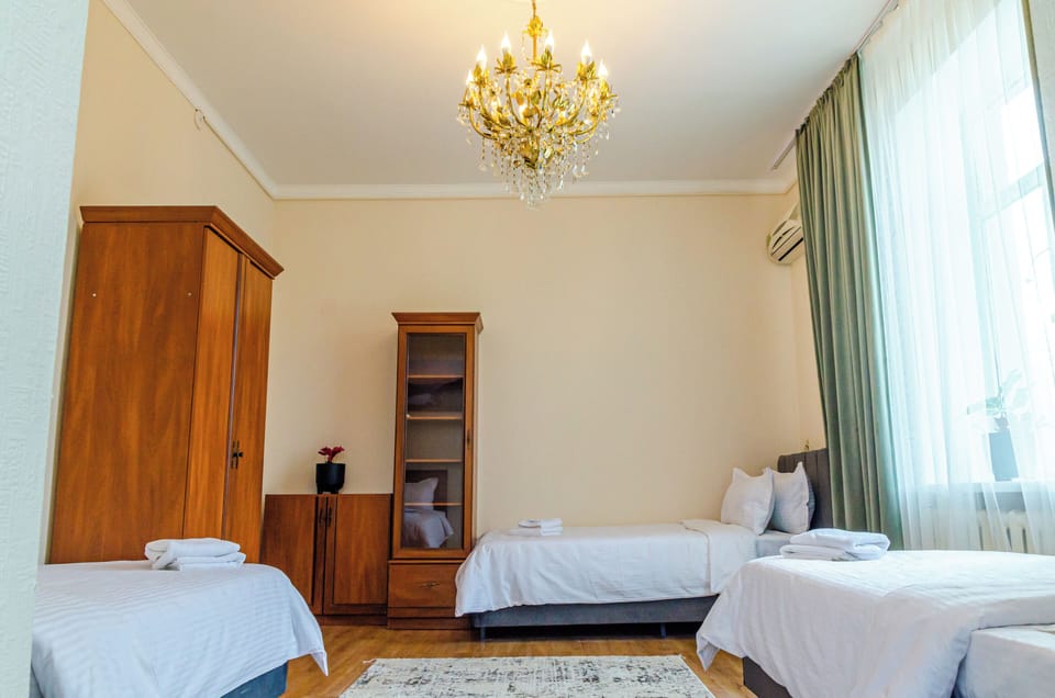 Basic Triple Room | Blackout drapes, iron/ironing board, free WiFi