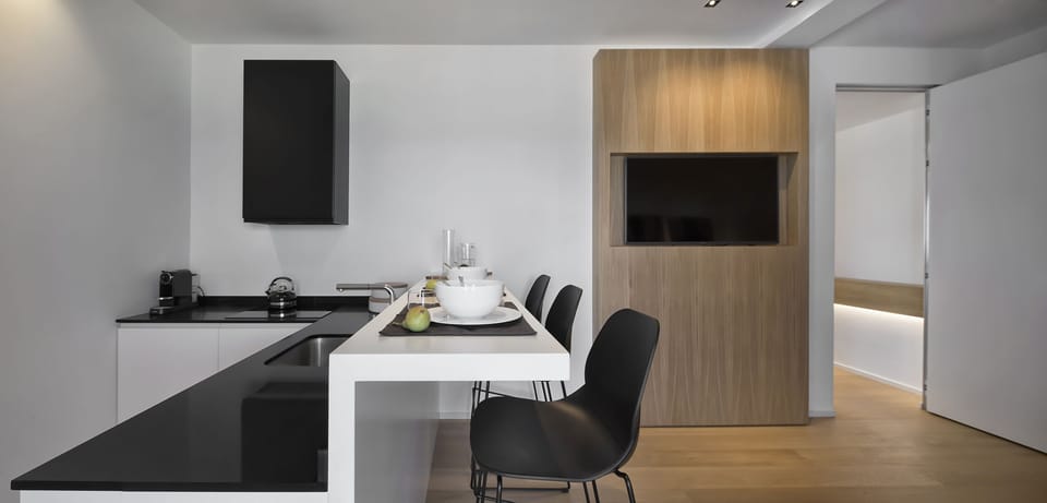 Panoramic Condo | Private kitchen | Mini-fridge, microwave (on request), stovetop, dishwasher