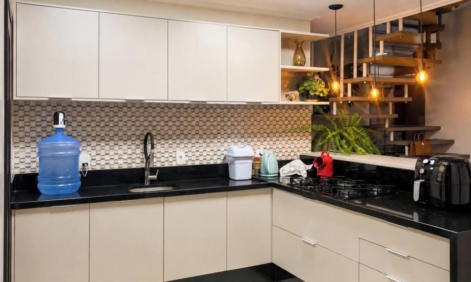 Family House | Private kitchen | Fridge, microwave, cookware/dishes/utensils, dining table