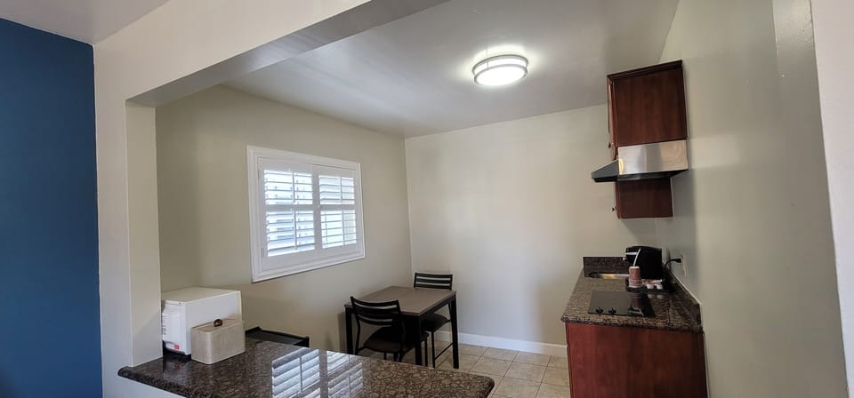Exclusive Room, 2 Queen Beds | Private kitchen | Fridge, microwave