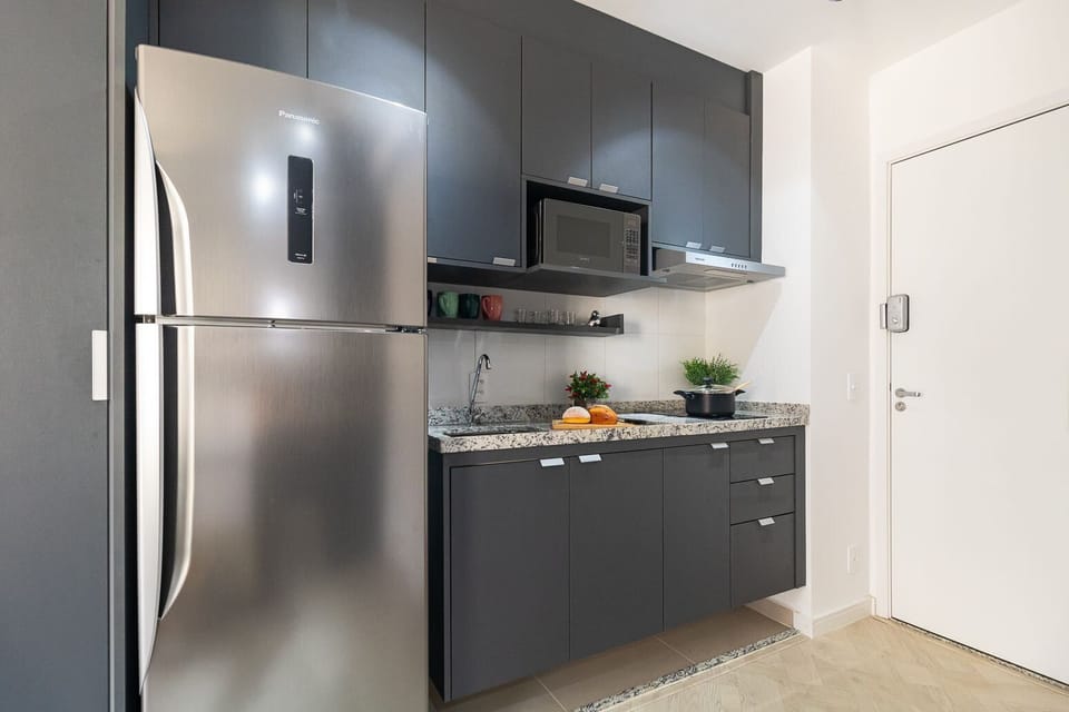 Apartment | Private kitchen | Fridge, microwave, cookware/dishes/utensils, cleaning supplies