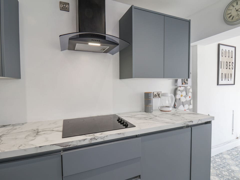 Fridge, electric kettle, toaster, cookware/dishes/utensils