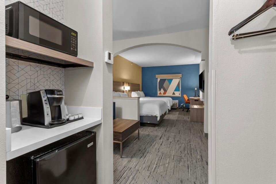 In-room safe, desk, iron/ironing board, cribs (free)