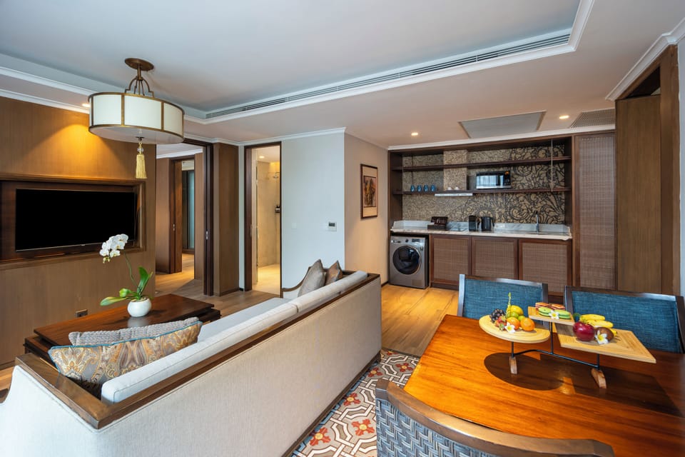 Two Bedroom Suite (Free access to Lounge & Afternoon Tea) | Living area | 42-inch Smart TV with satellite channels