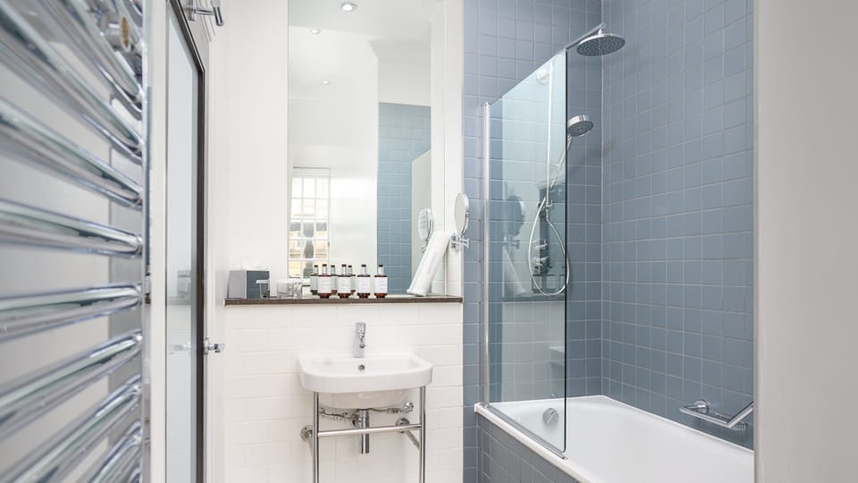 Eco-friendly toiletries, hair dryer, towels