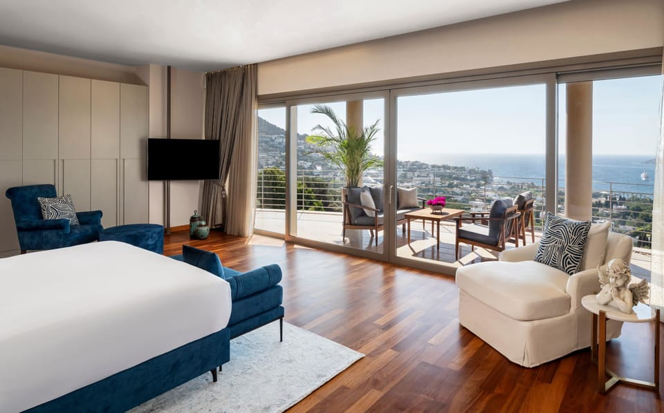Sea View Infinity Suite With Terrace | Minibar, in-room safe, desk, blackout drapes