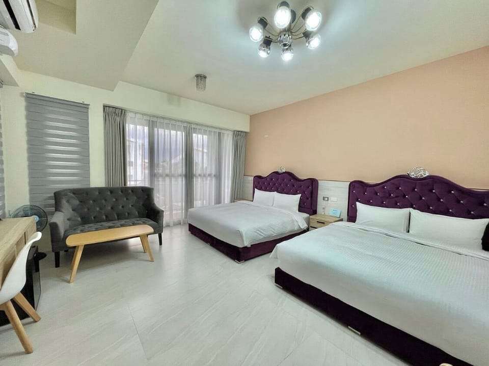 Deluxe Quadruple Room | Blackout drapes, soundproofing, iron/ironing board, free WiFi