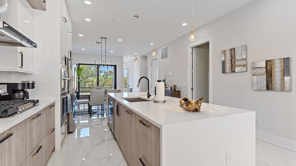 Townhome, 4 Bedrooms | Private kitchen | Fridge, oven, coffee/tea maker, toaster