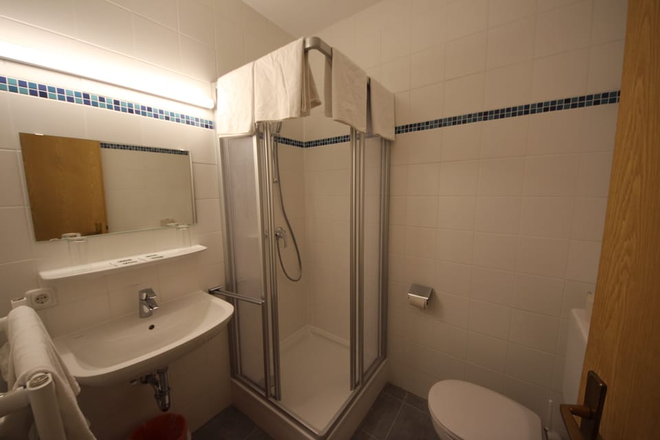 Shower, towels, soap, shampoo