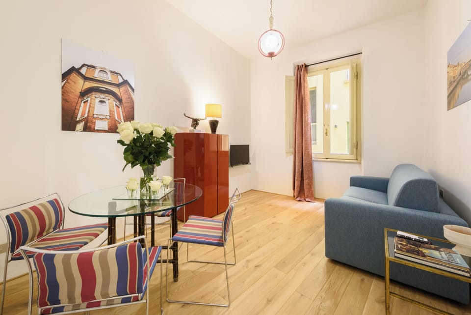 Design Apartment | Living area | 40-inch flat-screen TV with digital channels
