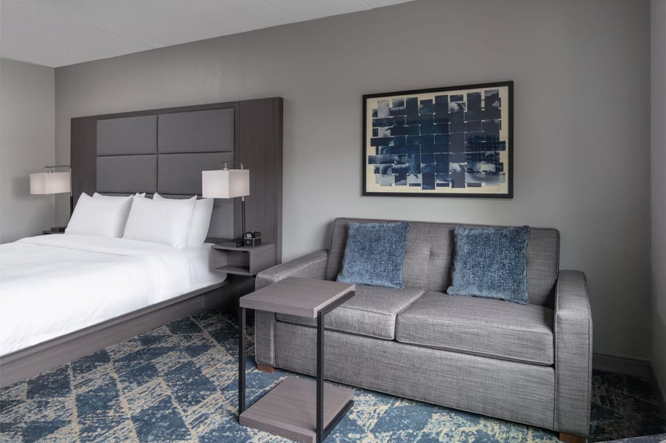 Room, 1 King Bed with Sofa bed | In-room safe, desk, laptop workspace, blackout drapes
