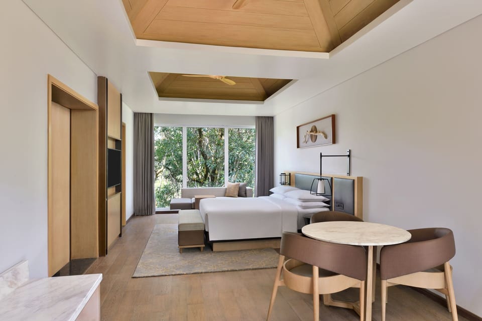 Premium bedding, down comforters, minibar, in-room safe