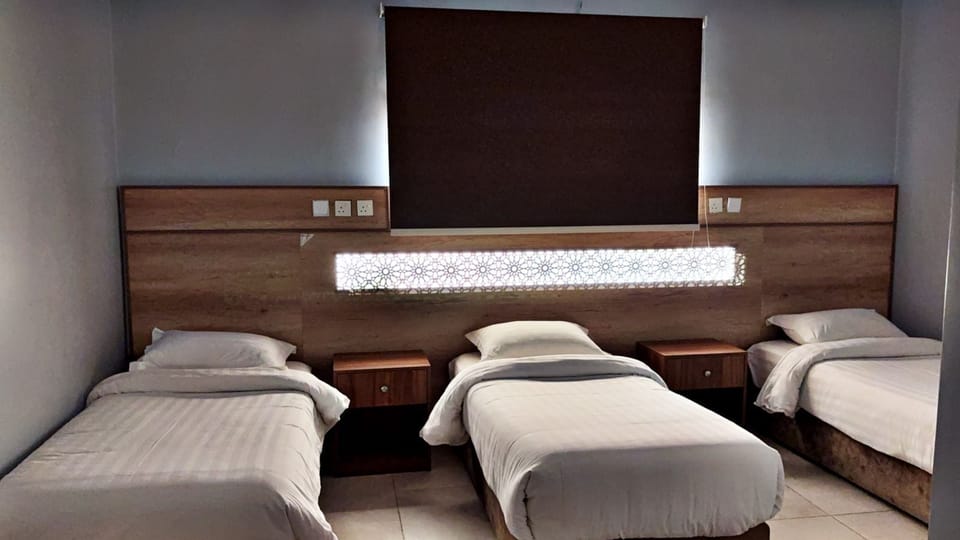 Triple Room | Egyptian cotton sheets, premium bedding, down comforters, pillowtop beds