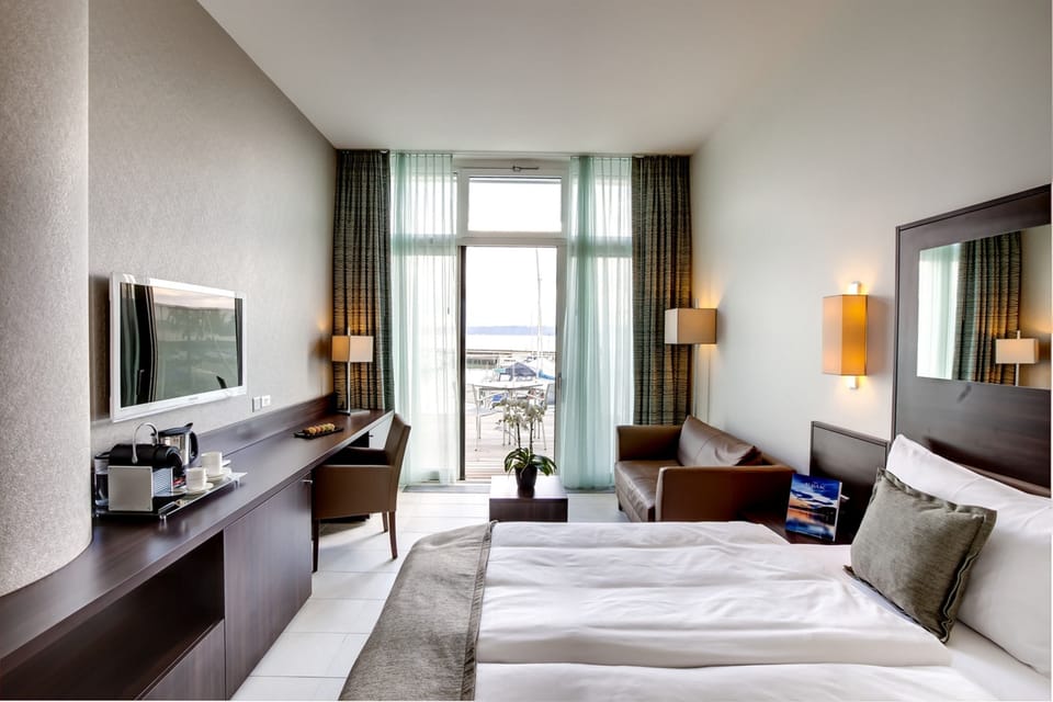 Deluxe Double Room, Terrace, Lake View | Minibar, in-room safe, desk, soundproofing