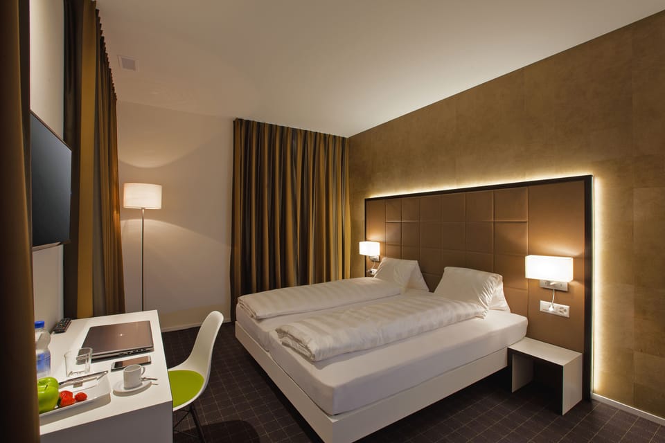 Premium bedding, in-room safe, desk, soundproofing