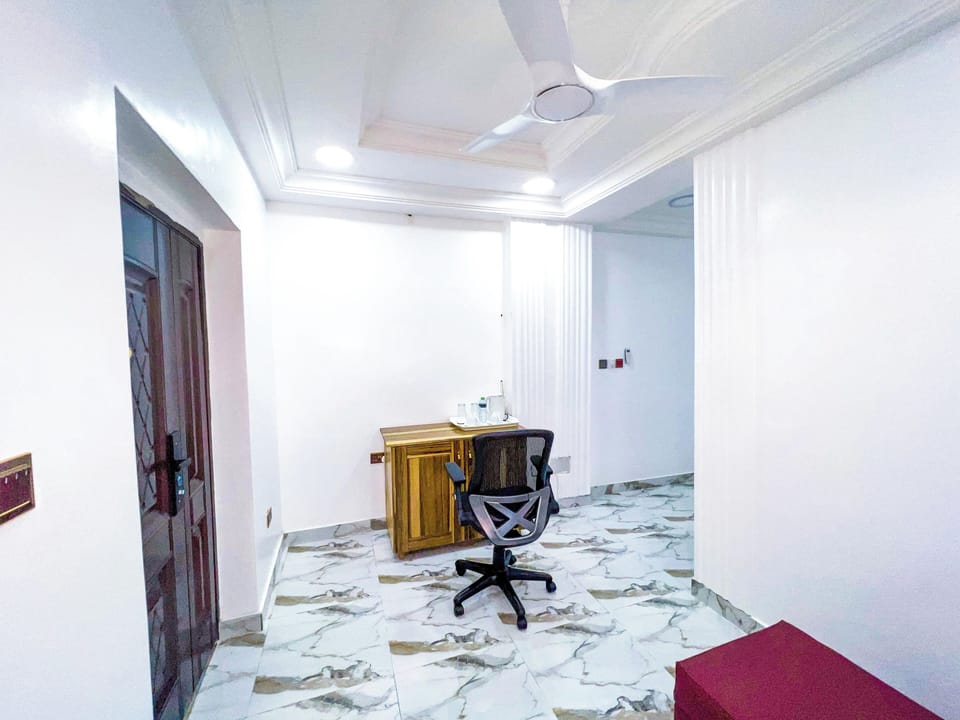 Executive Apartment | Living area | 42-inch Smart TV with satellite channels, Netflix, DVD player