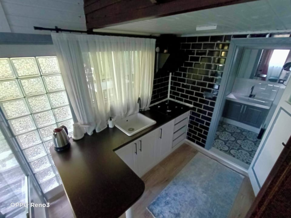 Family Bungalow | Private kitchen | Fridge, stovetop, coffee/tea maker, electric kettle
