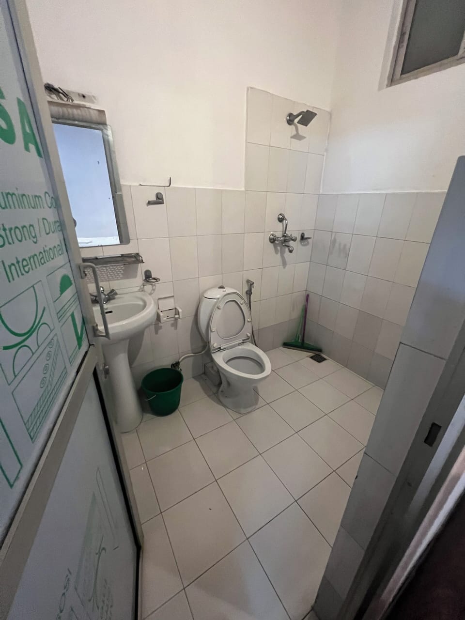 Shower, slippers, towels, soap