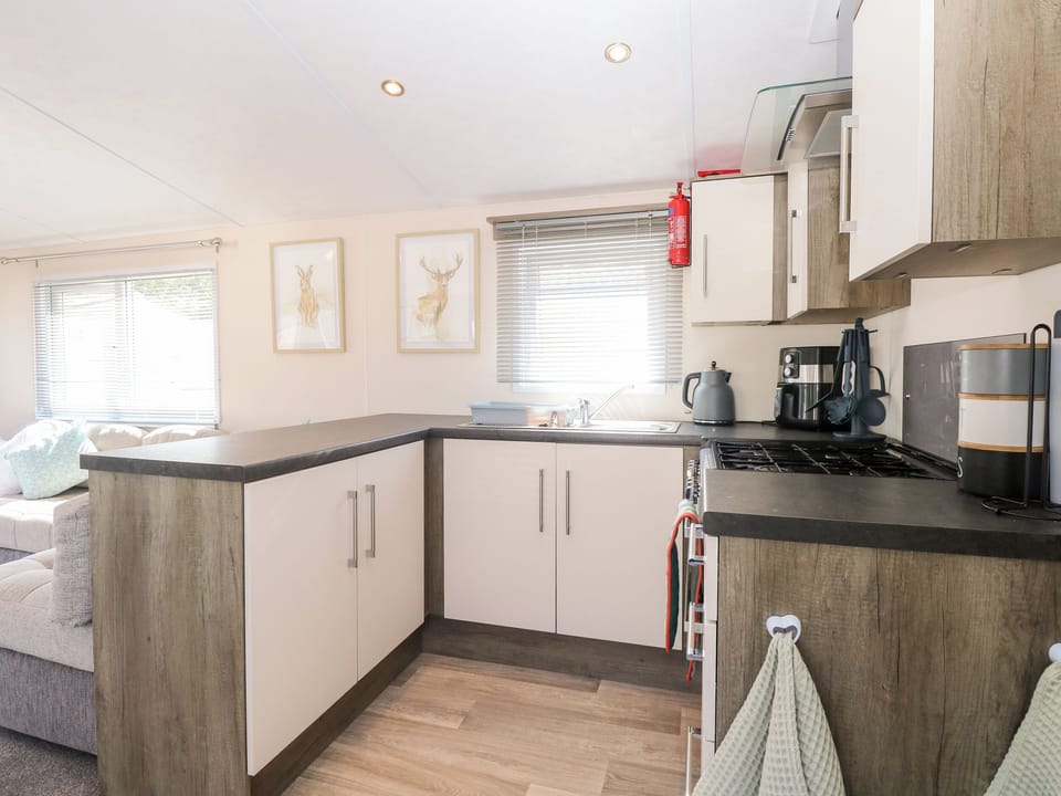 Fridge, electric kettle, toaster, cookware/dishes/utensils