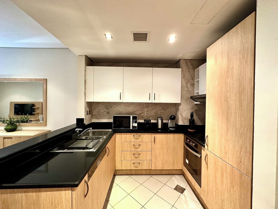 Panoramic Apartment | Private kitchen | Full-size fridge, microwave, oven, stovetop