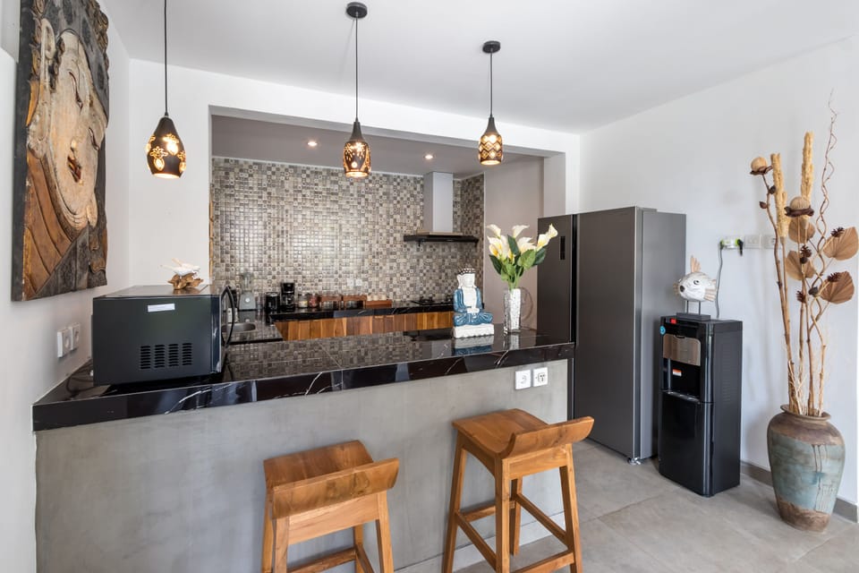 Exclusive Villa | Private kitchen | Fridge, microwave, stovetop, coffee/tea maker