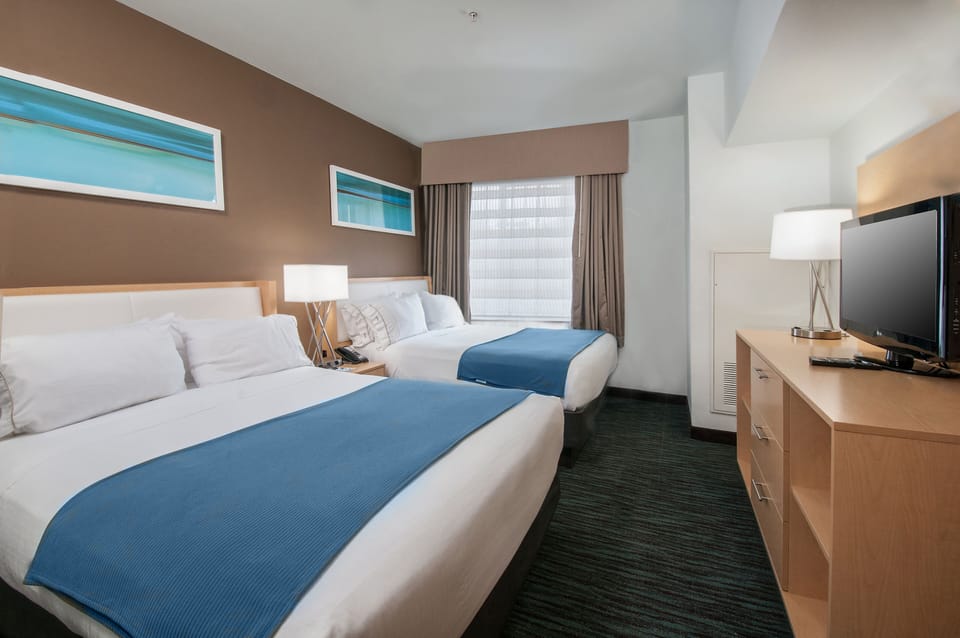 Standard Room, 2 Queen Beds | Desk, iron/ironing board, free cribs/infant beds, free WiFi