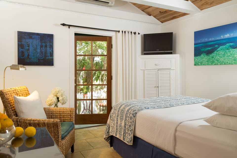 Conch Courtyard, Patio, Garden View - Adults Only | Premium bedding, pillowtop beds, individually decorated