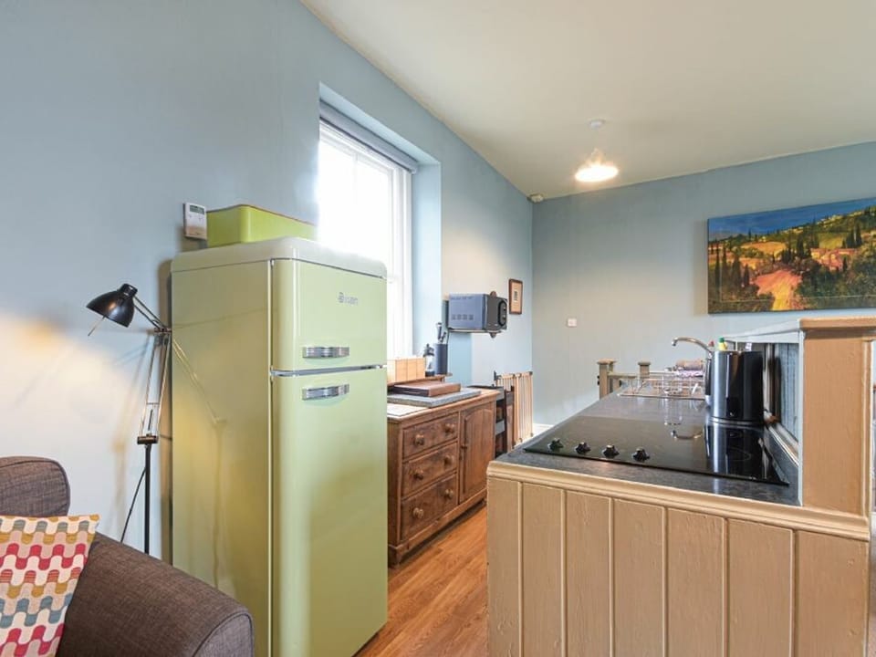 Fridge, electric kettle, cookware/dishes/utensils