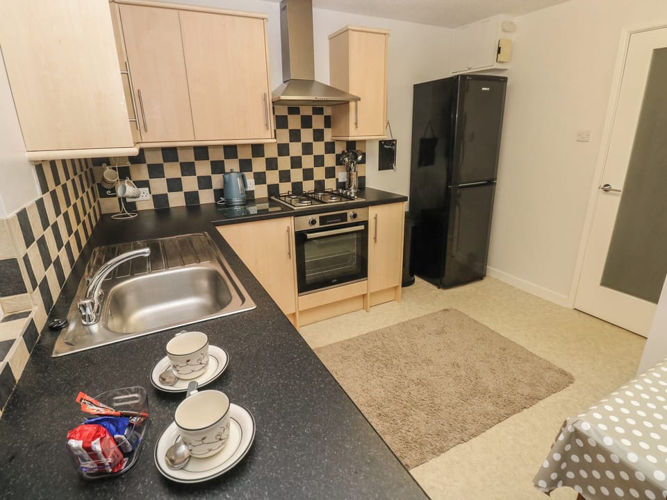 Fridge, electric kettle, toaster, cookware/dishes/utensils