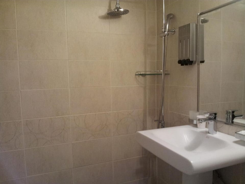 Shower, free toiletries, hair dryer, bathrobes
