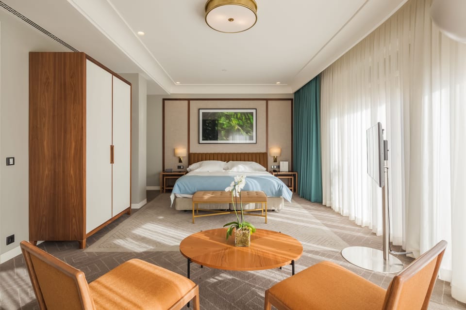 Premium bedding, down comforters, minibar, in-room safe