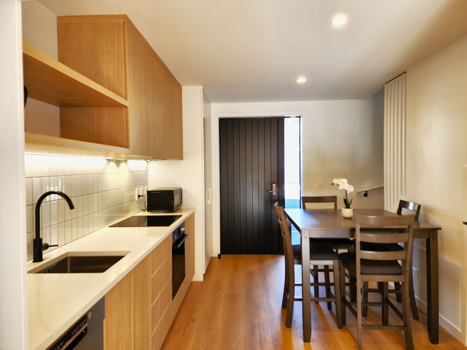 Signature Townhome | Private kitchen | Fridge, microwave, oven, stovetop