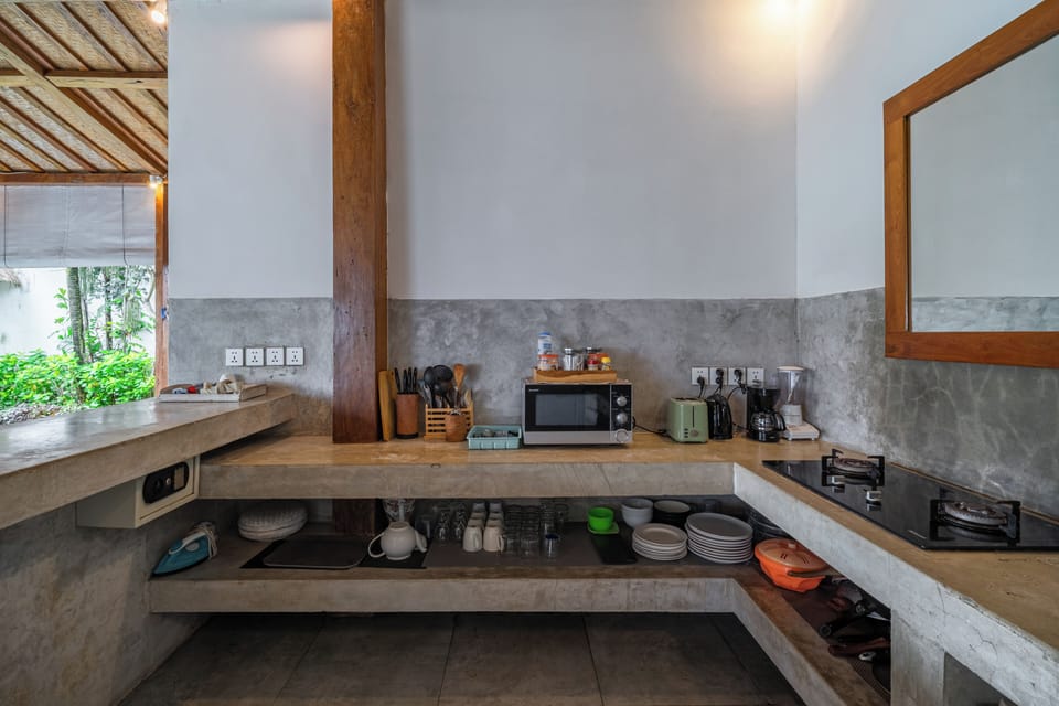 Luxury Villa | Private kitchen | Fridge, microwave, stovetop, electric kettle