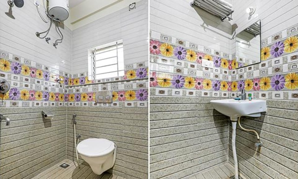 Deluxe Room | Bathroom | Shower, rainfall showerhead, free toiletries, towels
