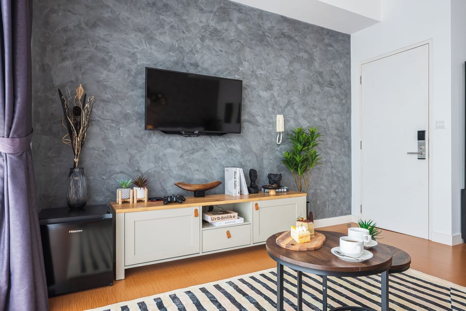 Luxury Apartment | Living area | 50-inch TV with digital channels, video-game console