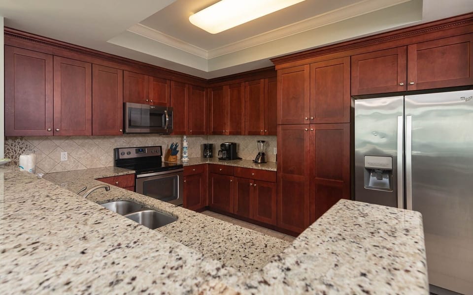 Condo, 4 Bedrooms | Private kitchen | Coffee/tea maker, fridge, oven